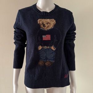 The Ivonic Navy Blue Teddy Bear Sweater with American Flag Detail